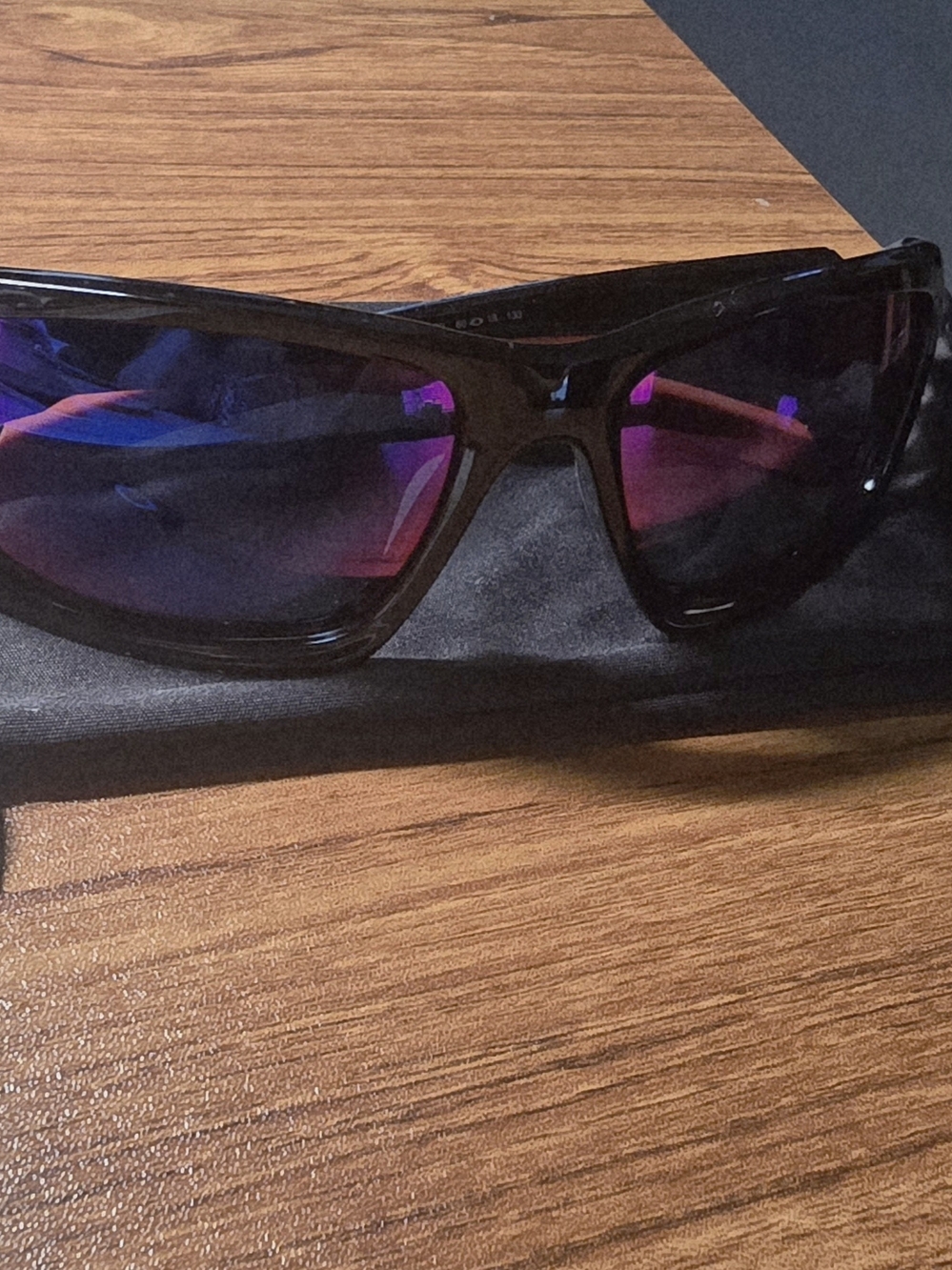Black Frame Sunglasses with Purple Mirrored Lenses
